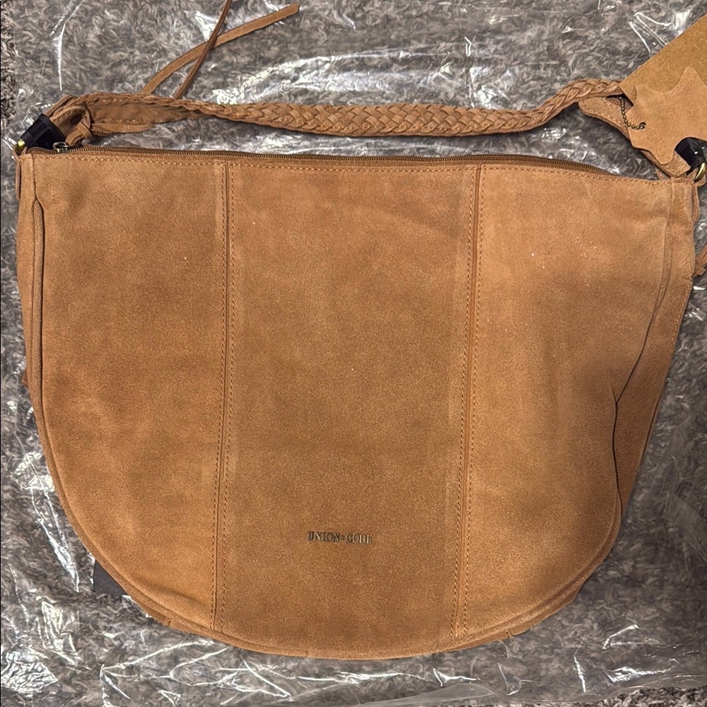 Tan Hobo Bag with Curved Shape and Soft Suede Texture
